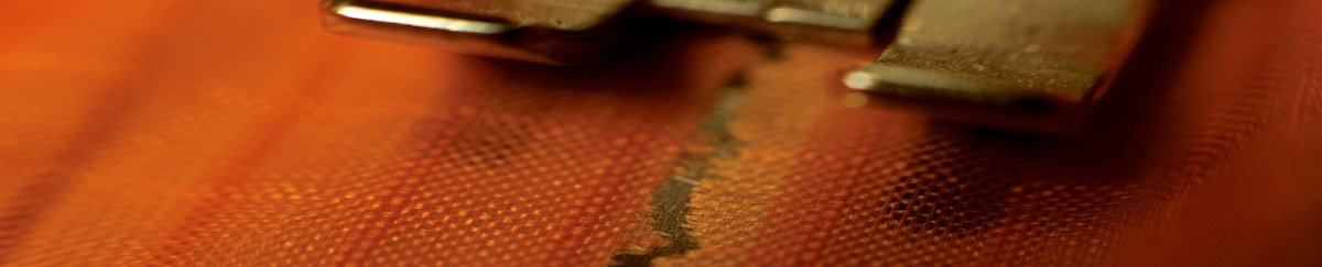 sewing machine showing detail of fabric during kite repair service 