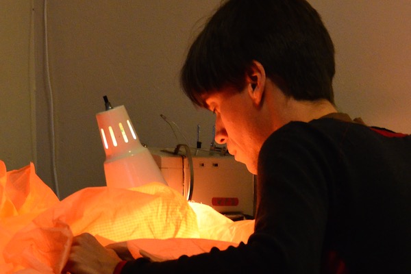 Tim Elverston repairing a ram air foil Kite