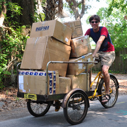 boxes of repaired kites on the truckbike